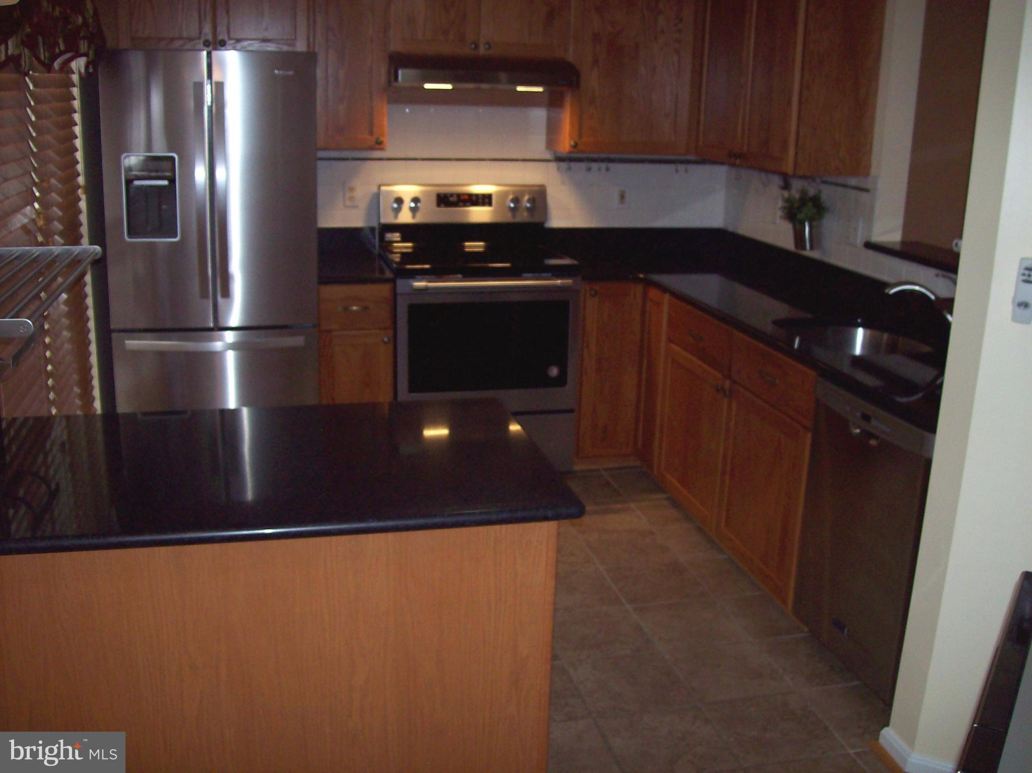 2128 Brigadier Boulevard Odenton, MD 21113 - Photo 6 of 24 New appliances, cabinets, tile & custom blinds