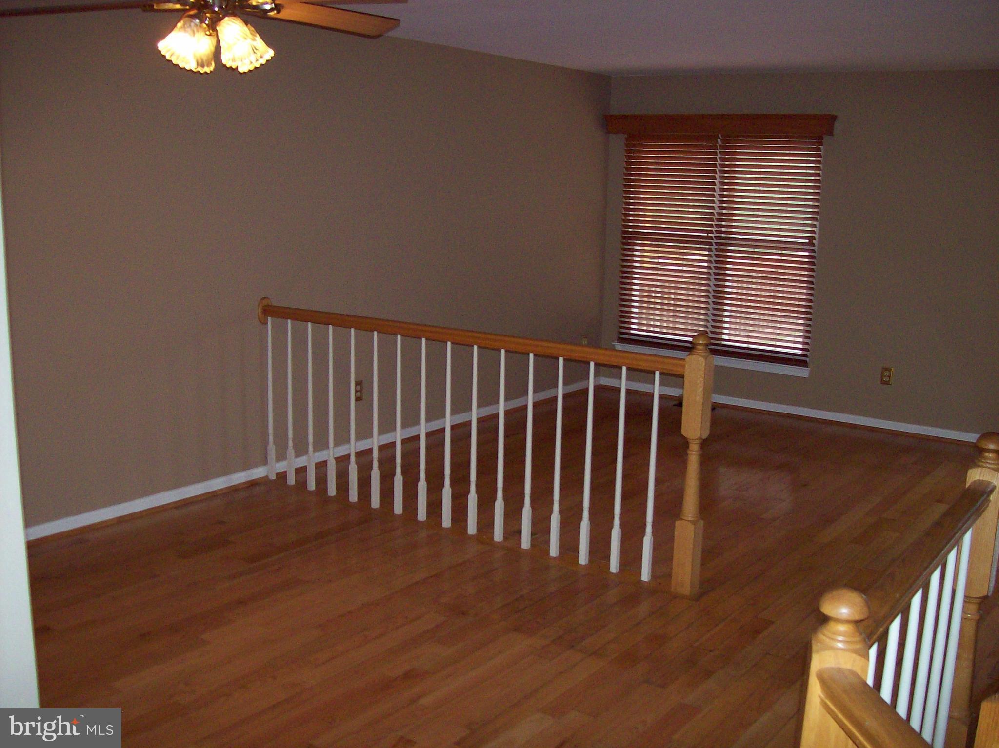 2128 Brigadier Boulevard Odenton, MD 21113 - Photo 8 of 24 Dining Room with impressive hardwood floor