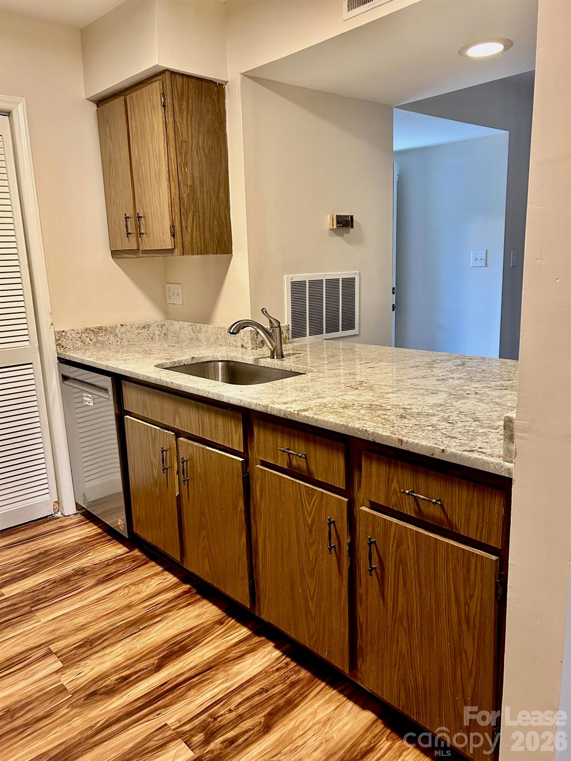 11020 Harrowfield Road Charlotte, NC 28226 - Photo 2 of 14 a bathroom with a granite countertop sink and a mirror