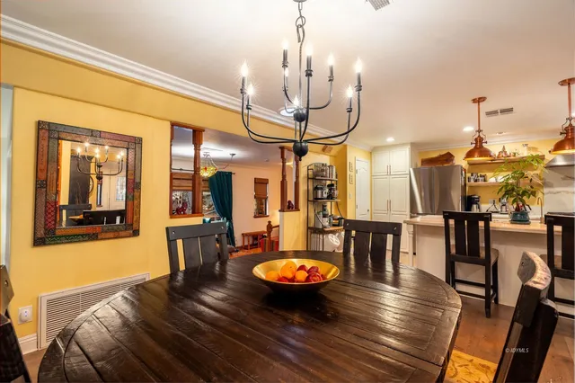 a view of a hallway with washer and dryer