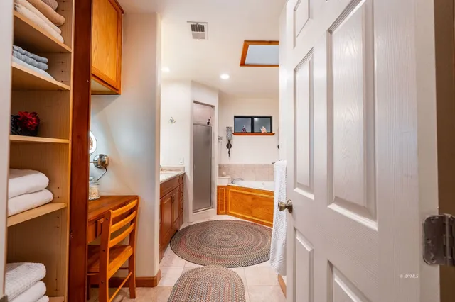 a view of a porch and garden