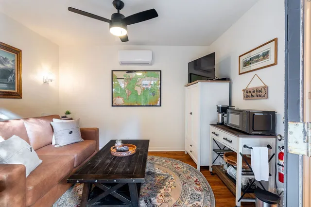 a view of a yard with flower plants