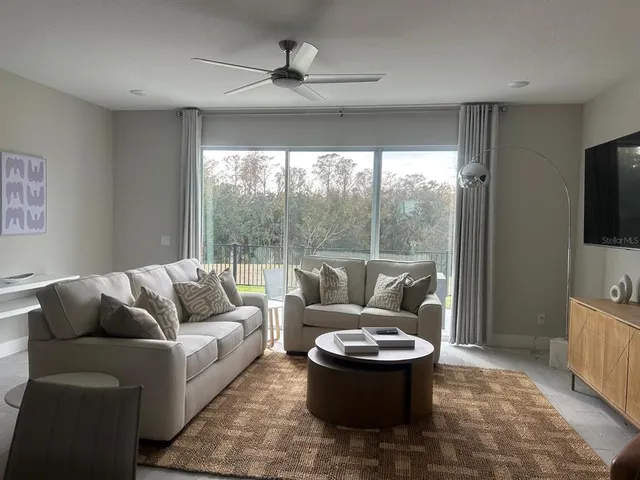 a view of a dining room with furniture