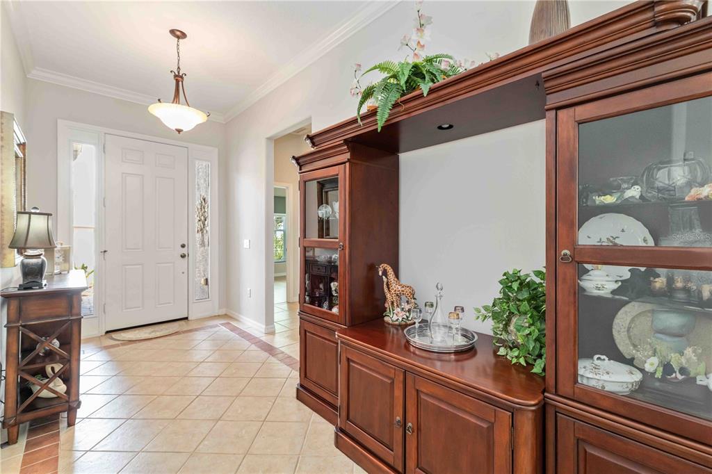 8150 Indigo Ridge Terrace University Park, FL 34201 - Photo 13 of 56 a spacious bathroom with a granite countertop sink a mirror and a shower