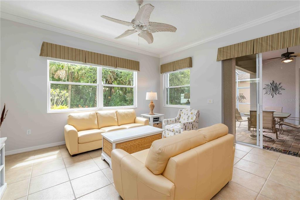 8150 Indigo Ridge Terrace University Park, FL 34201 - Photo 24 of 56 a living room with furniture and a large window