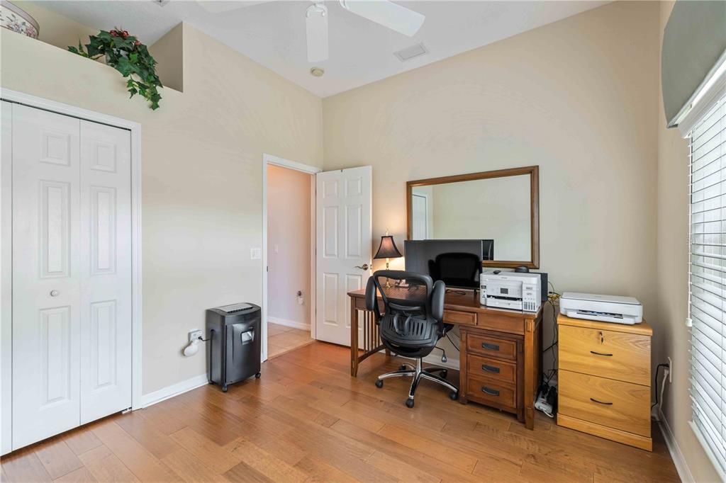 8150 Indigo Ridge Terrace University Park, FL 34201 - Photo 34 of 56 a view of a workspace with furniture and a window