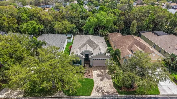 an aerial view of a house with a garden