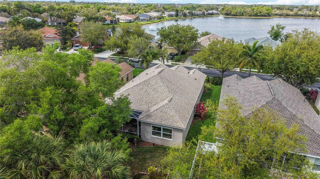 8150 Indigo Ridge Terrace University Park, FL 34201 - Photo 42 of 56 an aerial view of a house with outdoor space and lake view