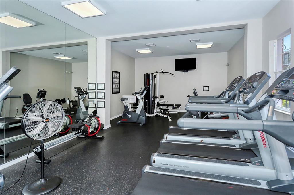 8150 Indigo Ridge Terrace University Park, FL 34201 - Photo 50 of 56 a view of a room with gym equipment