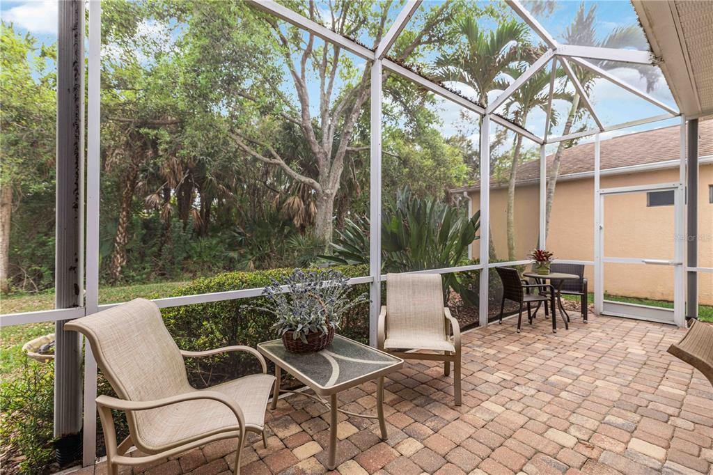 8150 Indigo Ridge Terrace University Park, FL 34201 - Photo 8 of 56 a view of a patio with a yard