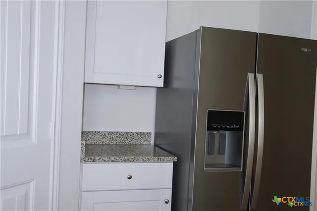a close view of a refrigerator in kitchen