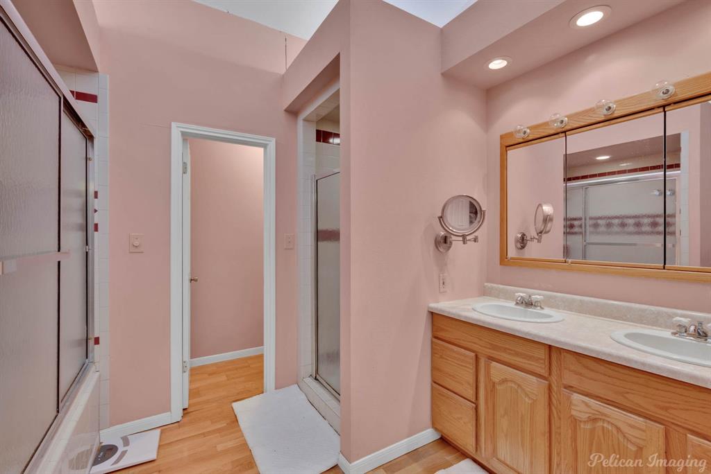 5905 Highway 175 Frierson, LA 71027 - Photo 12 of 29 a bathroom with a granite countertop sink and a mirror