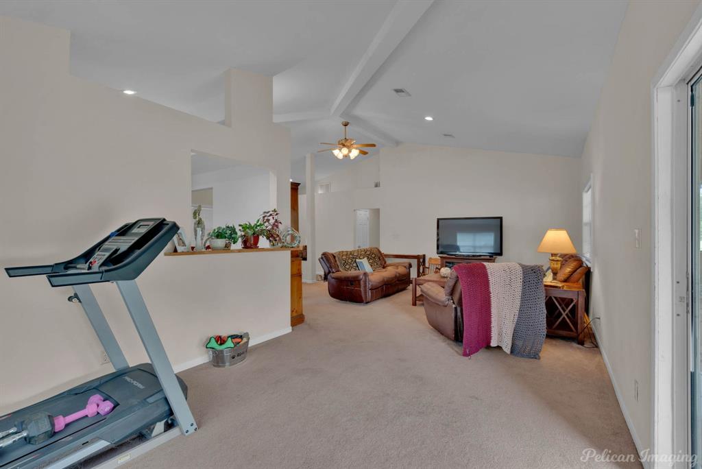 5905 Highway 175 Frierson, LA 71027 - Photo 20 of 29 a living room with furniture and a flat screen tv