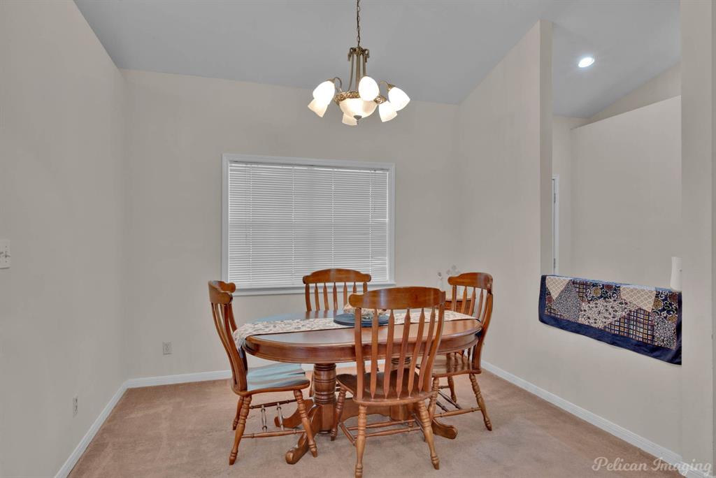 5905 Highway 175 Frierson, LA 71027 - Photo 7 of 29 a dining room with furniture and chandelier