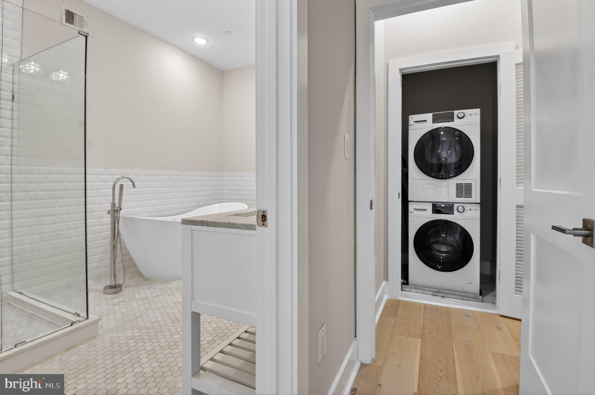 217 20th Street Northeast, Unit 2 Washington, DC 20002 - Photo 12 of 17 Modern bathroom with laundry nook.
