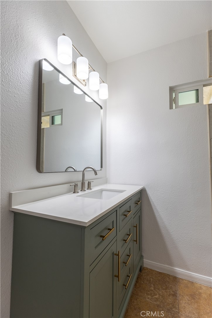 10495 Cook Riverside, CA 92505 - Photo 14 of 19 a bathroom with a sink and a mirror