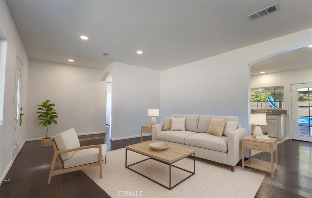 10495 Cook Riverside, CA 92505 - Photo 3 of 19 a living room with furniture and a potted plant