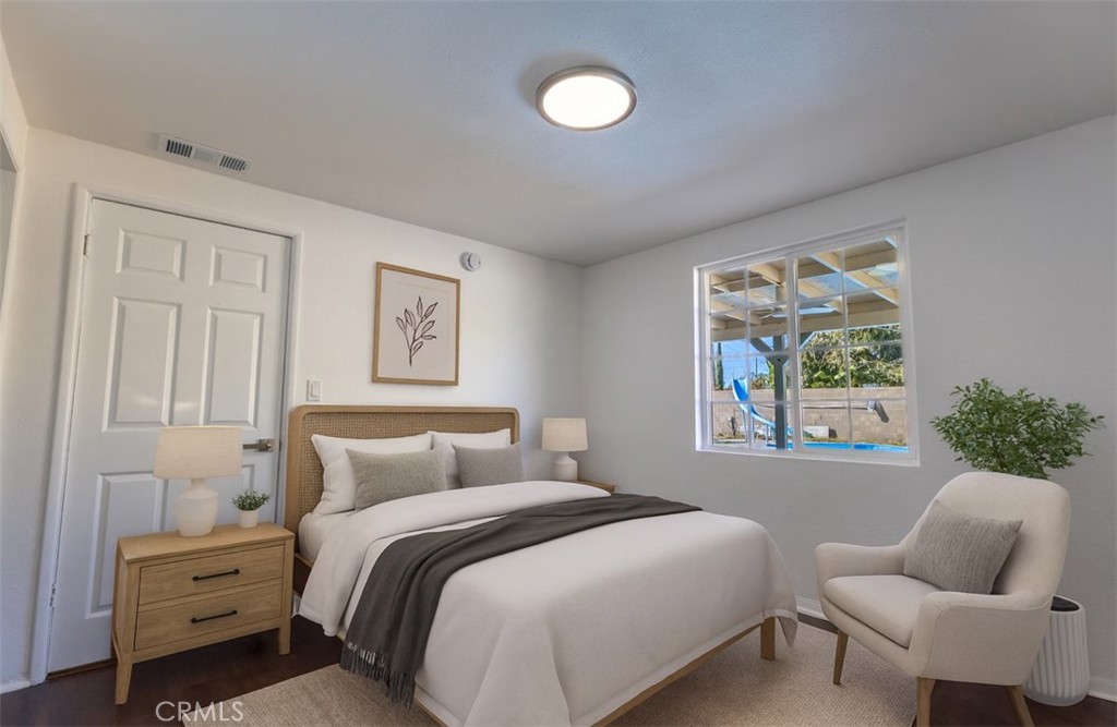 10495 Cook Riverside, CA 92505 - Photo 7 of 19 a bedroom with a bed and a window