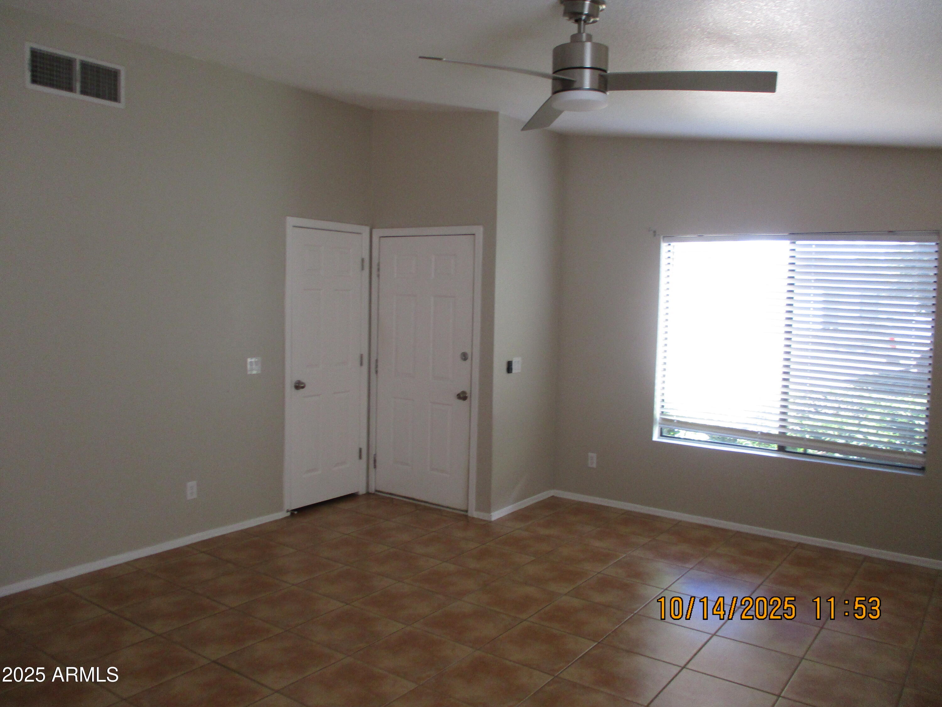 4724 Territorial Loop Sierra Vista, AZ 85635 - Photo 2 of 16 an empty room with a window