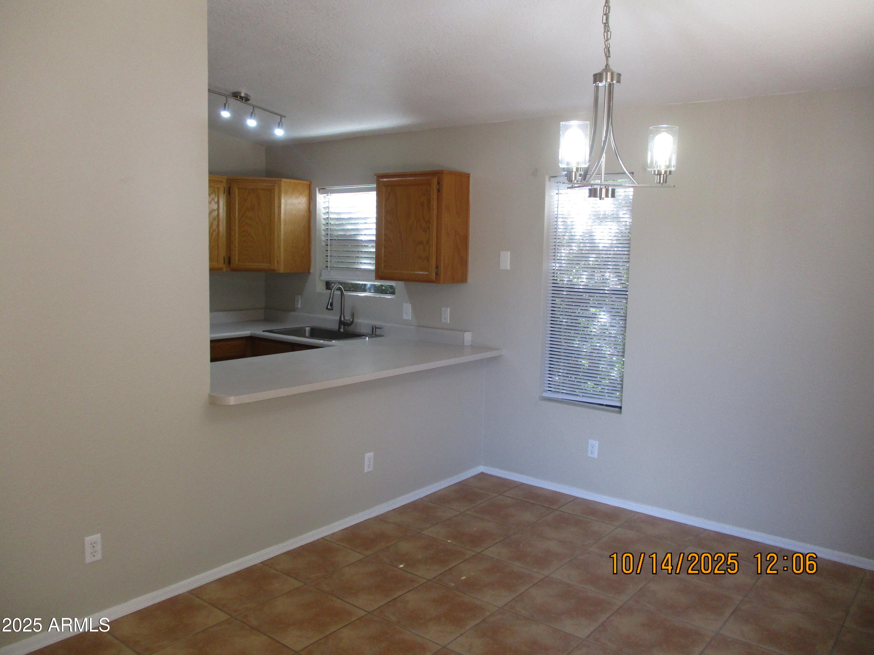 4724 Territorial Loop Sierra Vista, AZ 85635 - Photo 5 of 16 a view of a kitchen and a sink