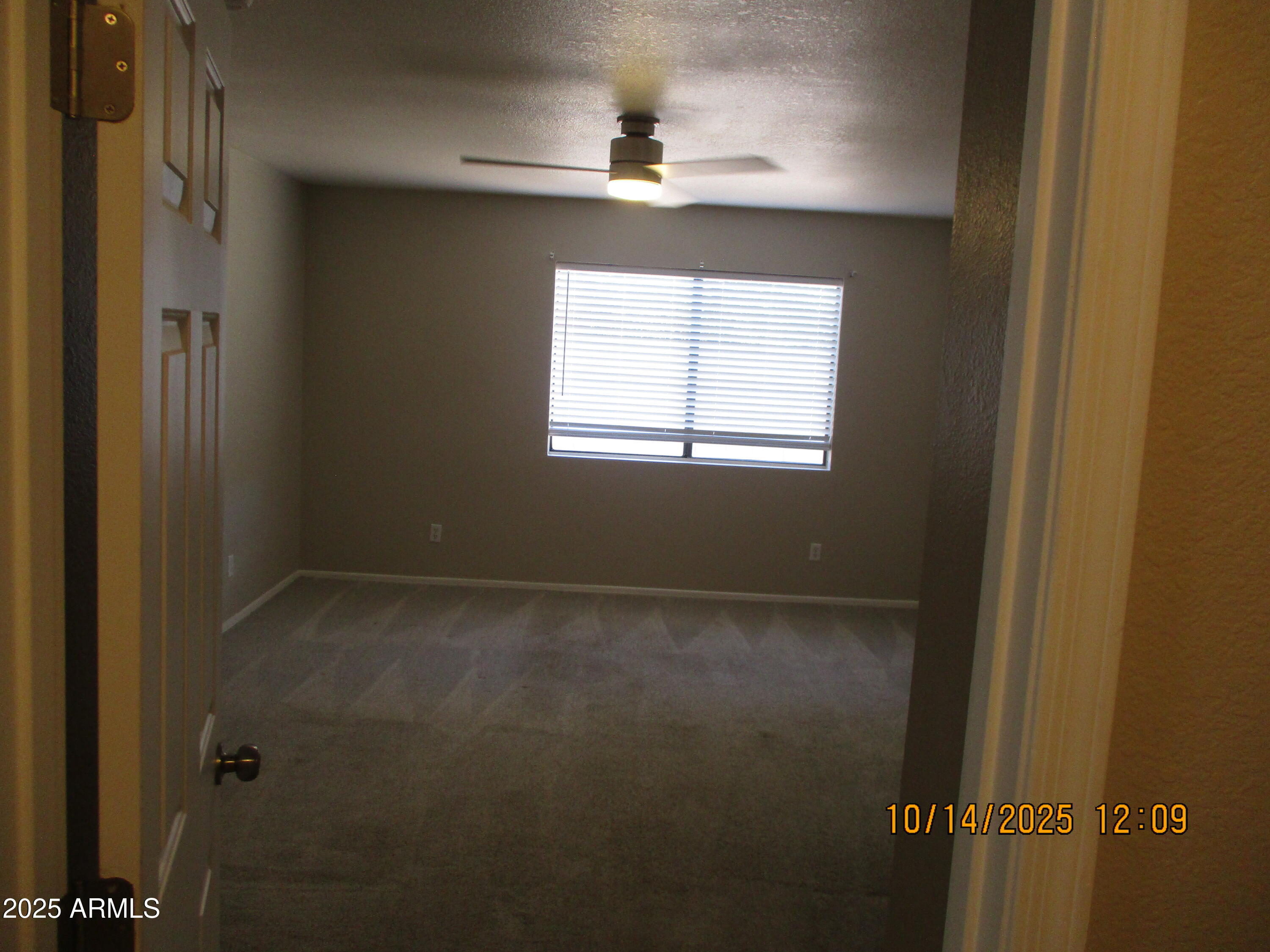 4724 Territorial Loop Sierra Vista, AZ 85635 - Photo 7 of 16 a view of an empty room with a window
