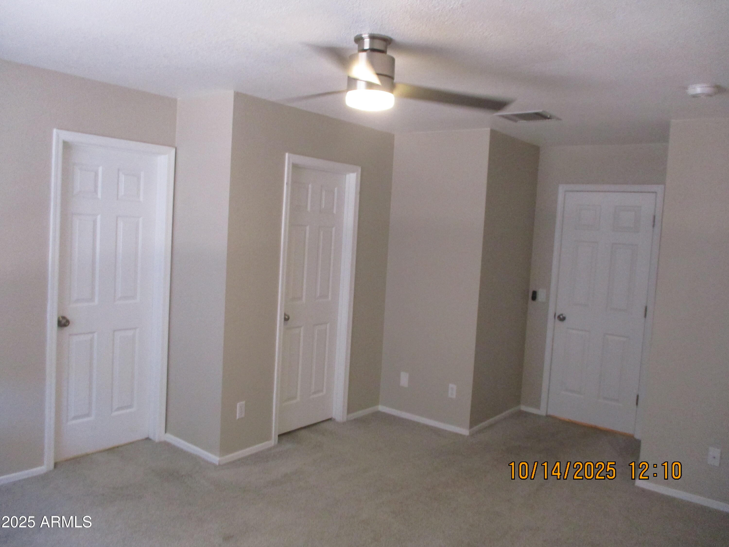 4724 Territorial Loop Sierra Vista, AZ 85635 - Photo 8 of 16 a view of empty room with a ceiling fan