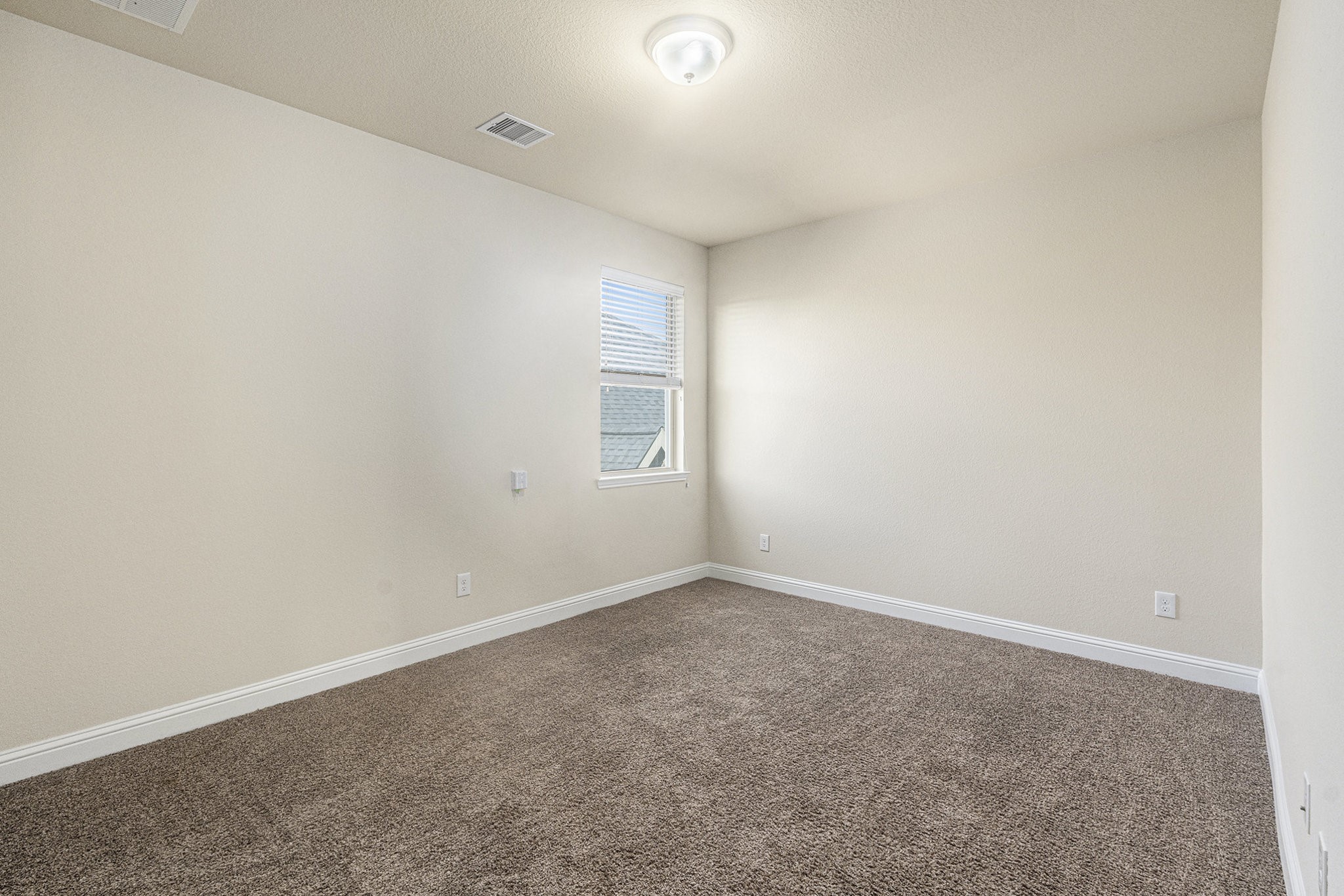 18614 Rimini Ridge Court Cypress, TX 77429 - Photo 25 of 35 an empty room with windows