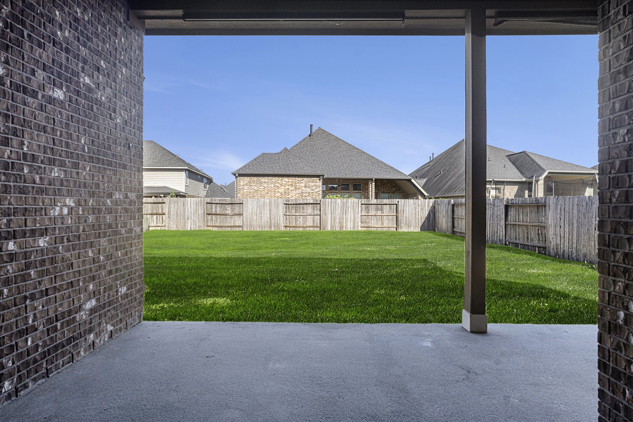 18614 Rimini Ridge Court Cypress, TX 77429 - Photo 29 of 35 a view of a house with a yard