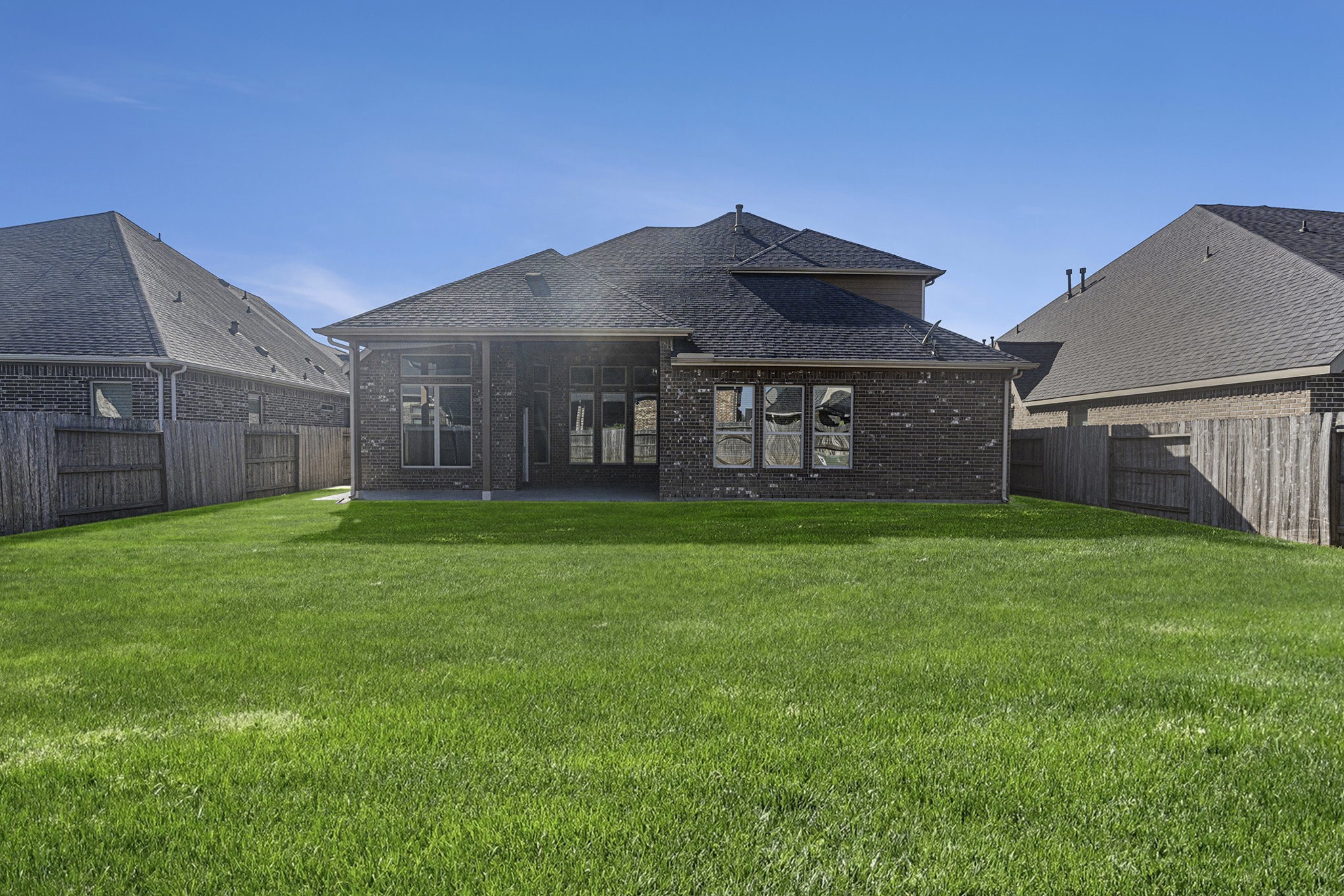 18614 Rimini Ridge Court Cypress, TX 77429 - Photo 31 of 35 a front view of a house with garden