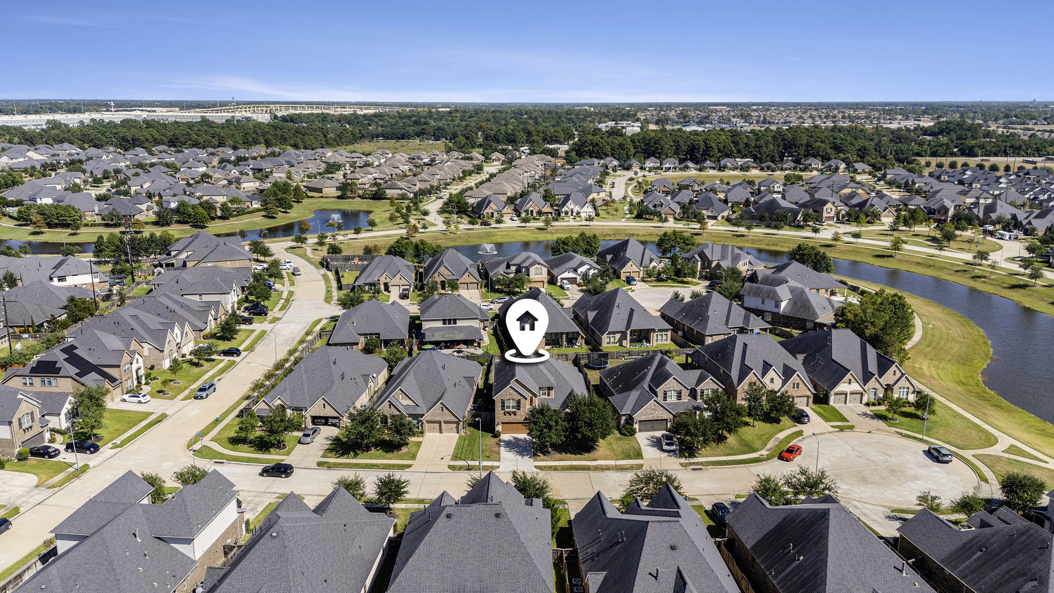 18614 Rimini Ridge Court Cypress, TX 77429 - Photo 32 of 35 an aerial view of residential building and lake