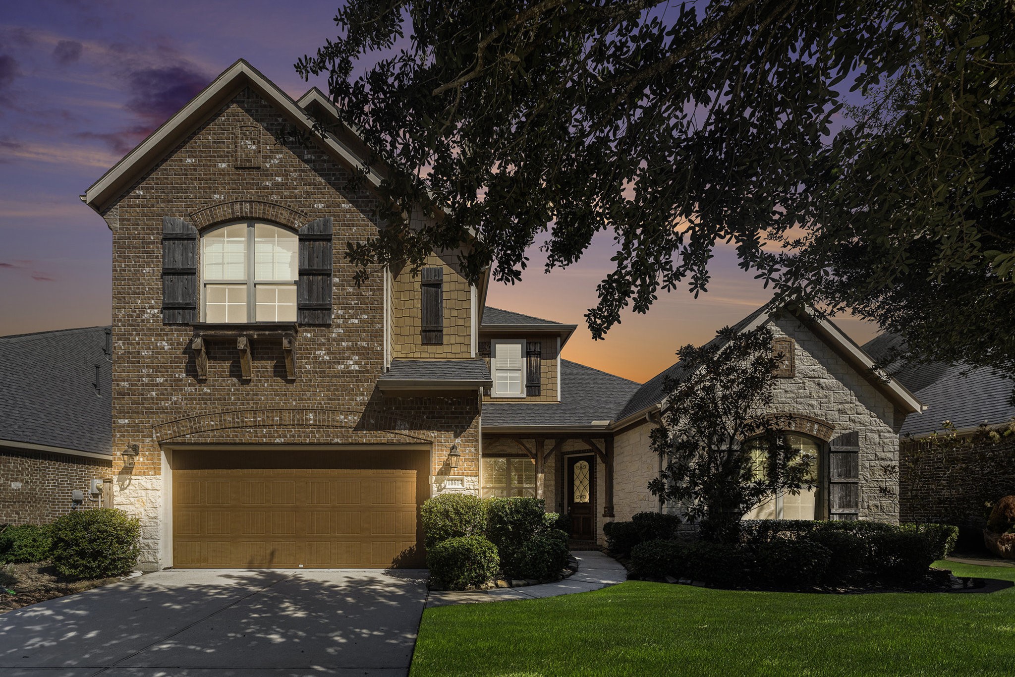 18614 Rimini Ridge Court Cypress, TX 77429 - Photo 35 of 35 a front view of a house with a yard and garage
