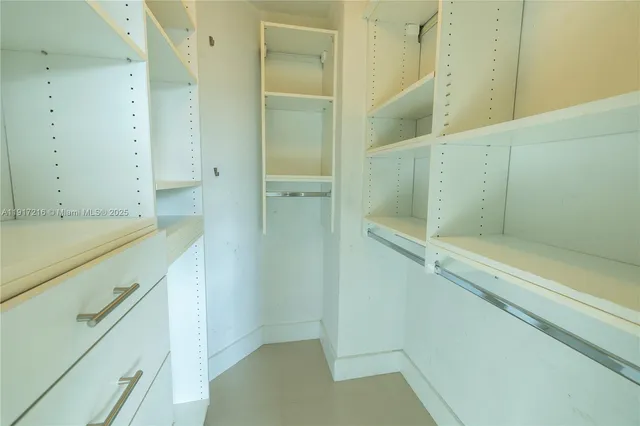 a bathroom with a sink and vanity