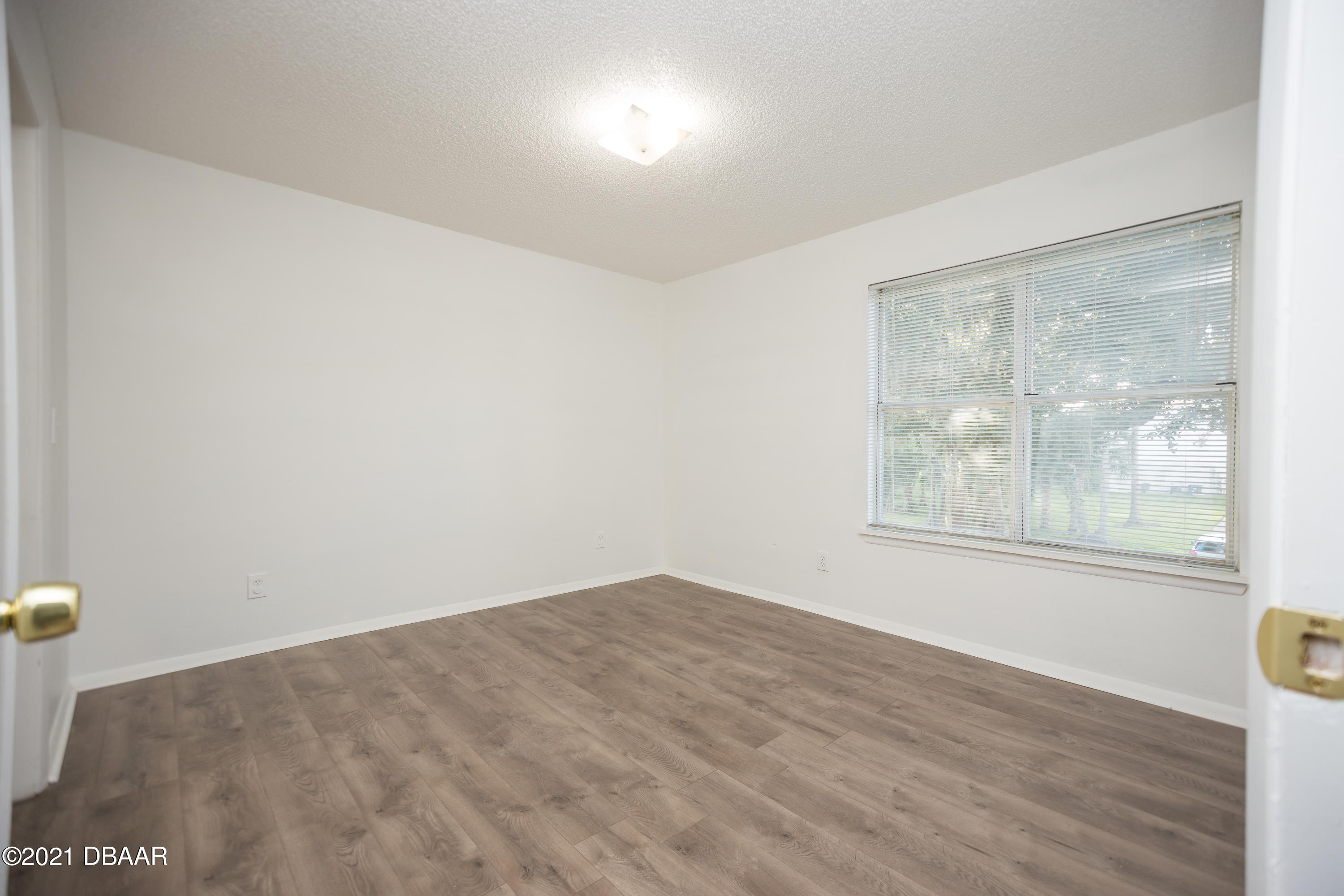 1600 Big Tree Road, Unit B8 South Daytona, FL 32119 - Photo 25 of 27 a view of empty room with window