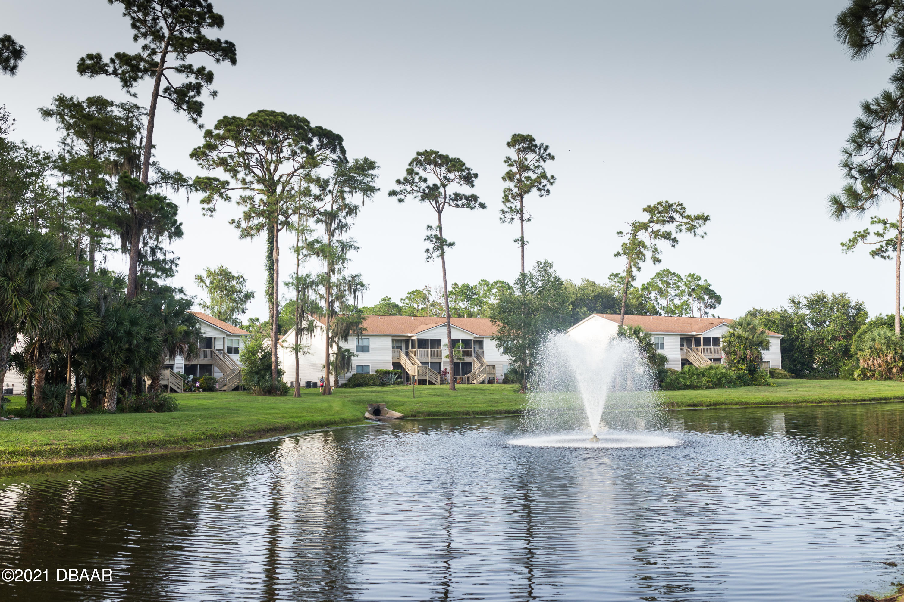 1600 Big Tree Road, Unit B8 South Daytona, FL 32119 - Photo 26 of 27 a view of a lake with houses