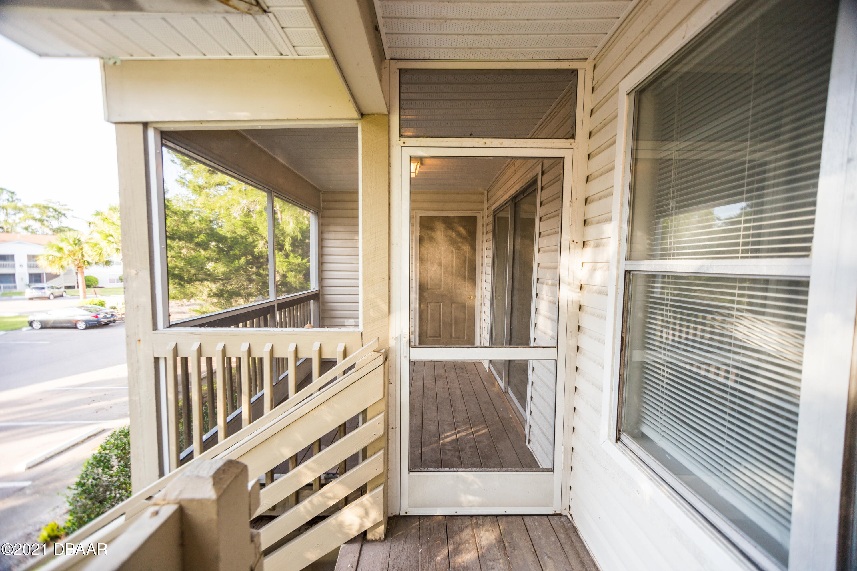1600 Big Tree Road, Unit B8 South Daytona, FL 32119 - Photo 3 of 27 a view of balcony with wooden floor