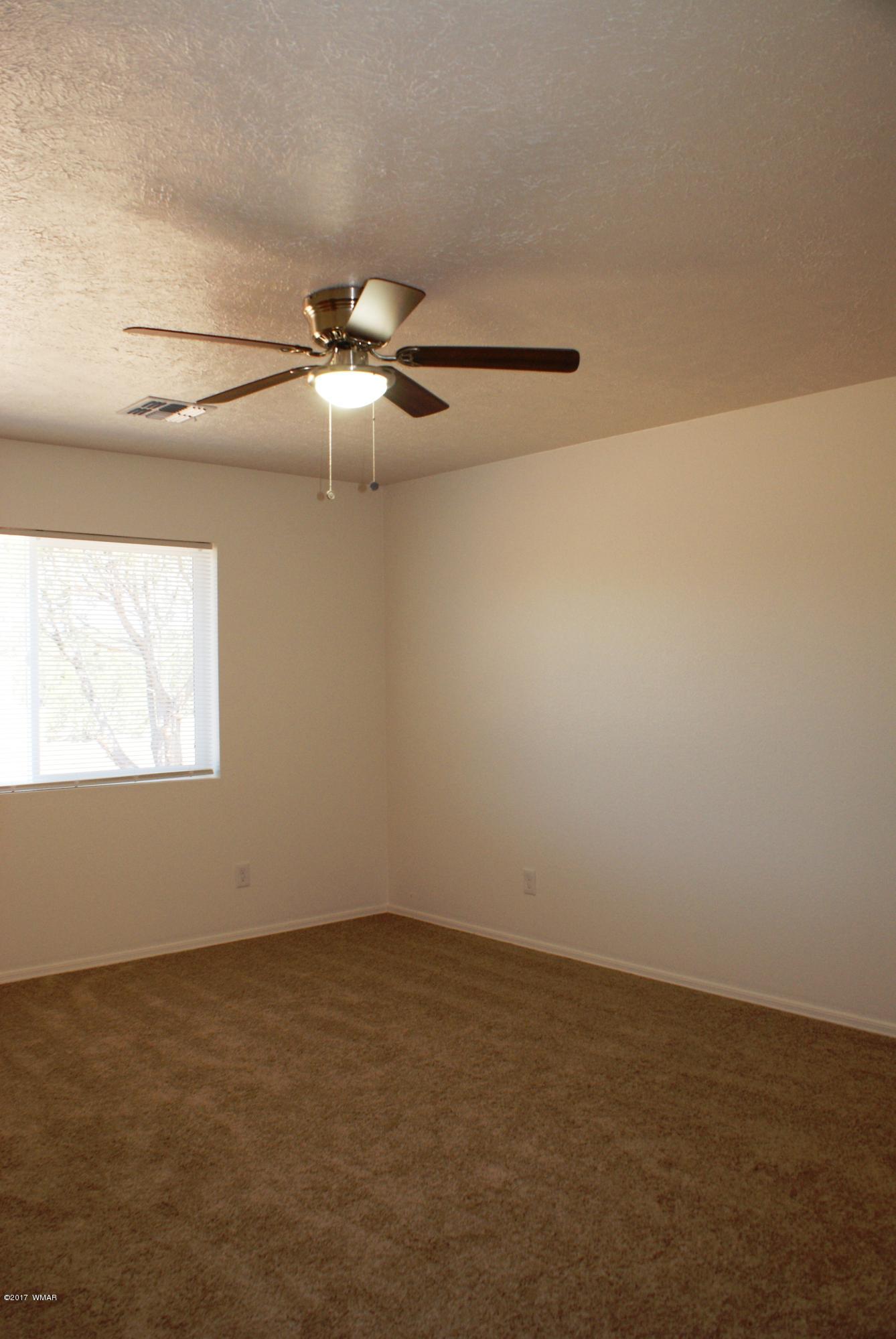 2628 Elk Run Loop Show Low, AZ 85901 - Photo 14 of 26 a view of a room with an empty space