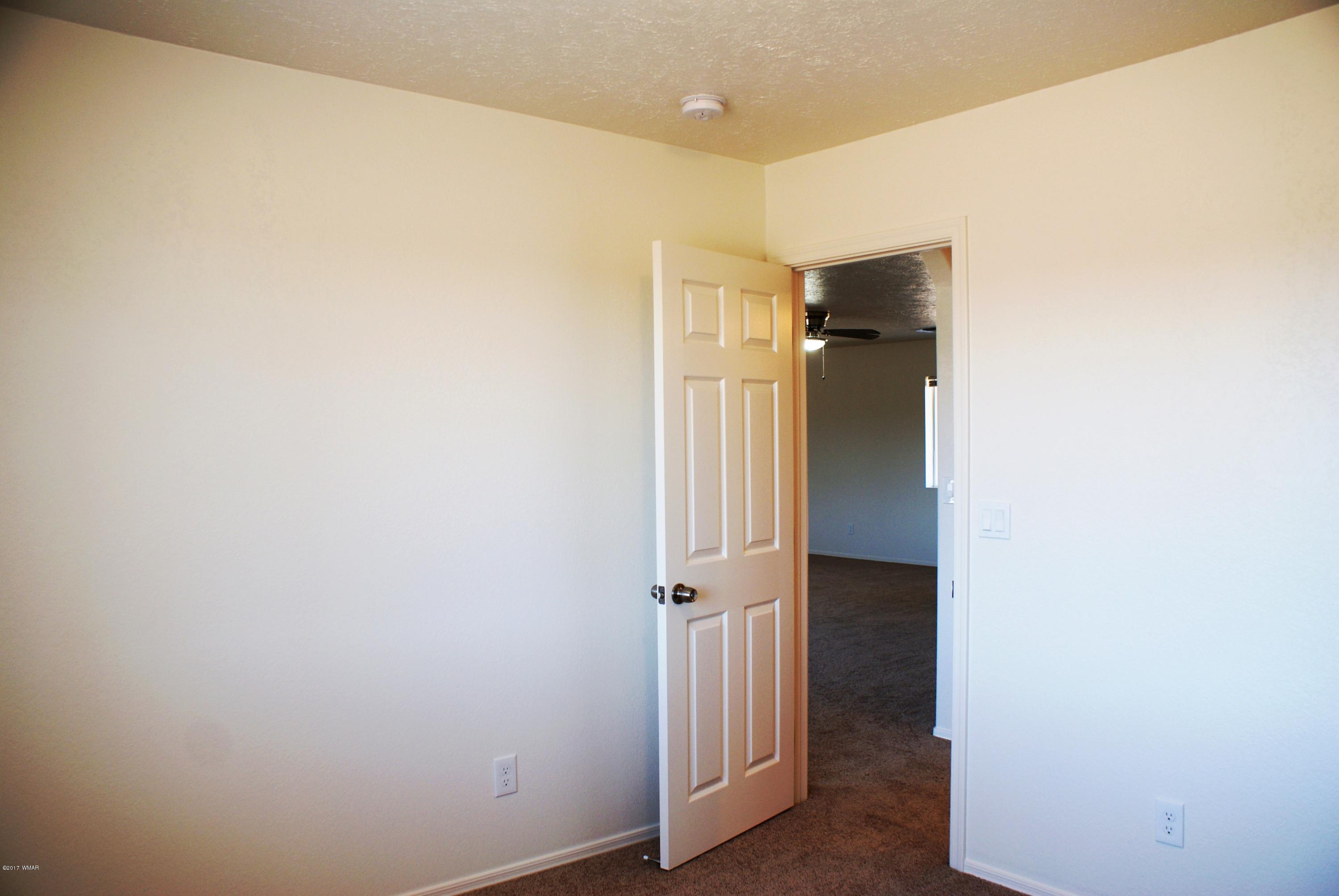 2628 Elk Run Loop Show Low, AZ 85901 - Photo 16 of 26 a view of a hallway
