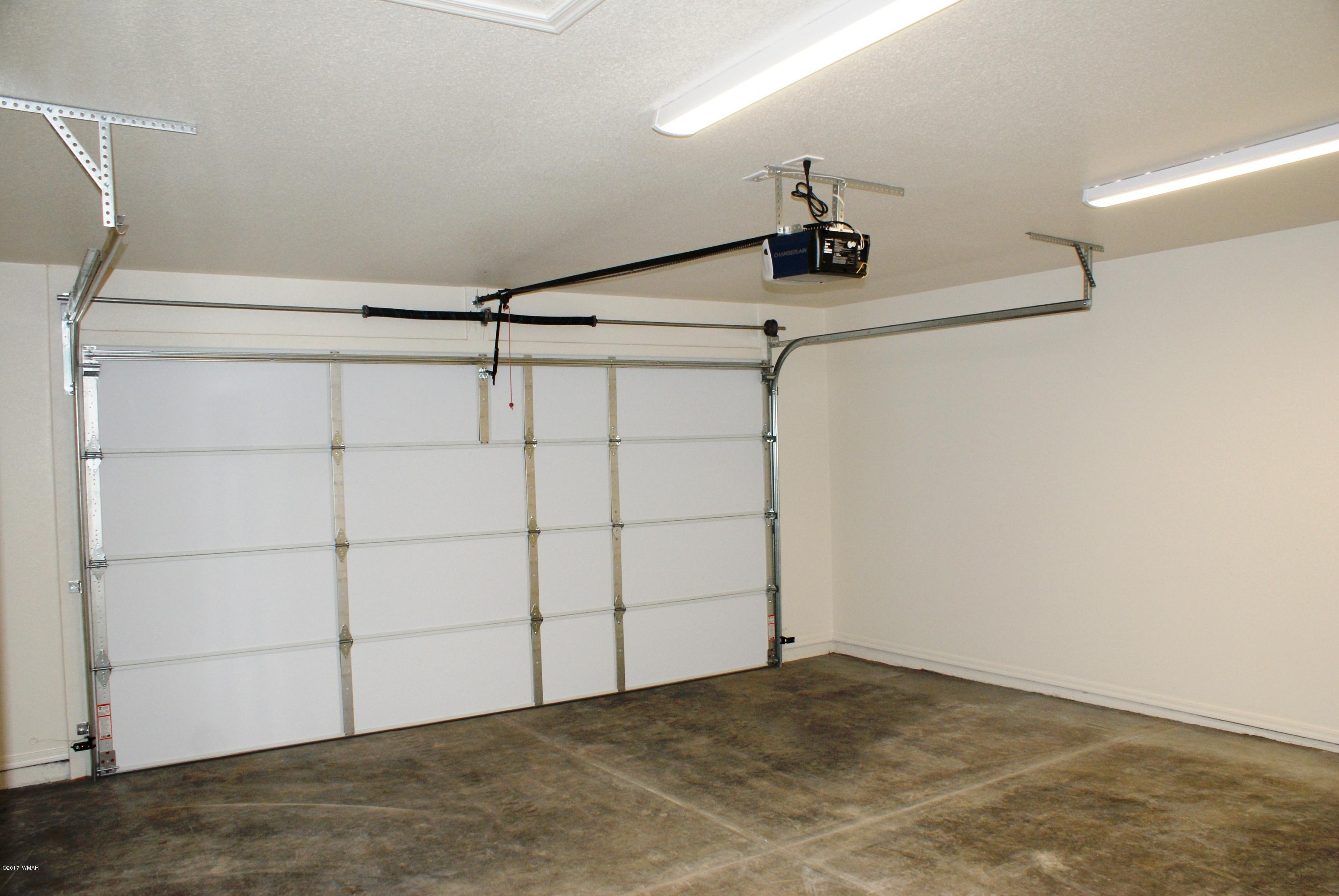 2628 Elk Run Loop Show Low, AZ 85901 - Photo 19 of 26 a view of a garage