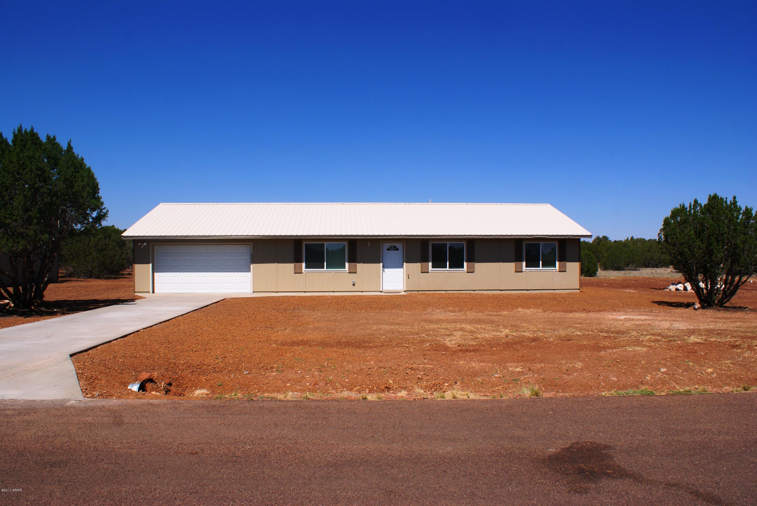 2628 Elk Run Loop Show Low, AZ 85901 - Photo 2 of 26 a view of swimming pool with outdoor seating