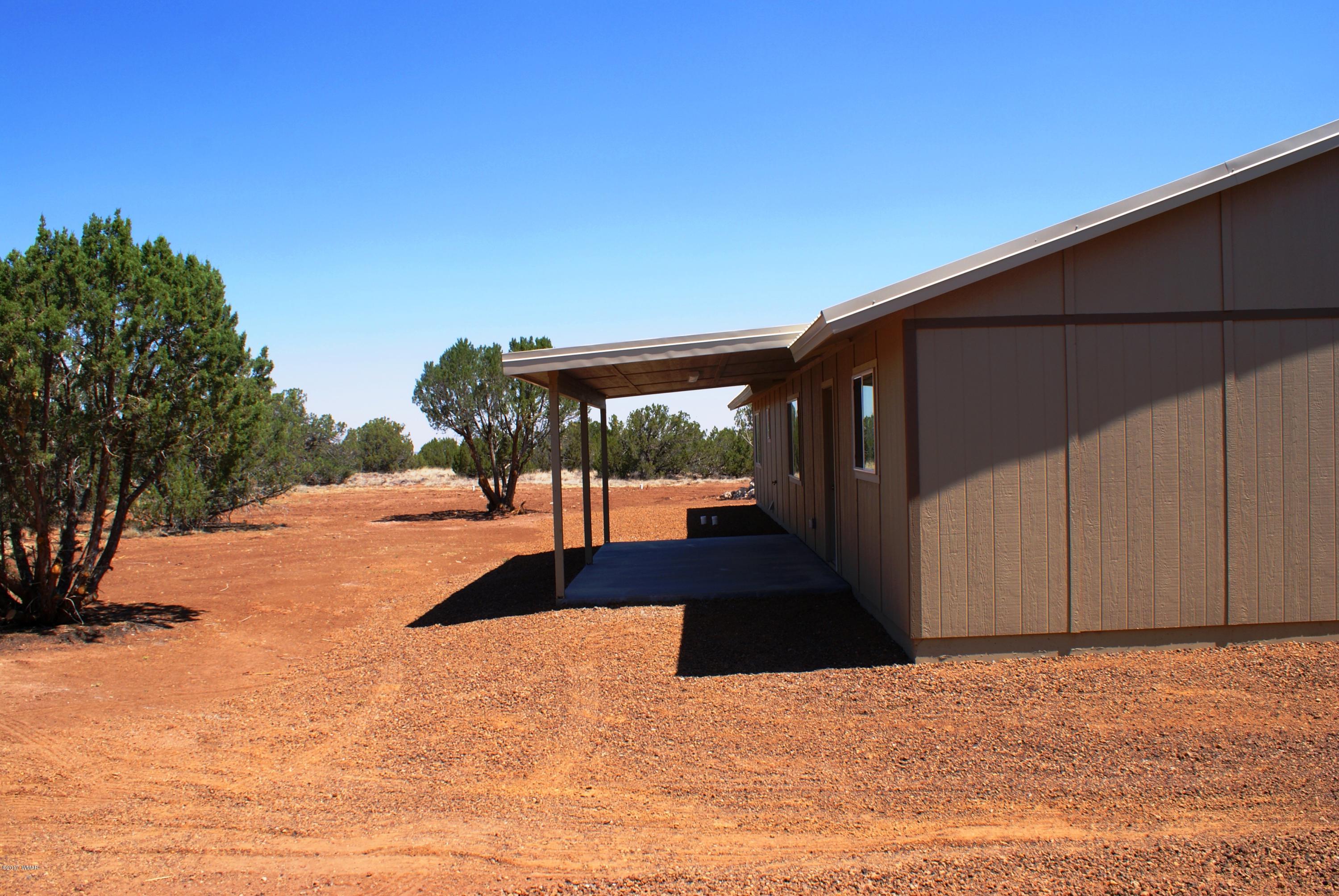 2628 Elk Run Loop Show Low, AZ 85901 - Photo 21 of 26 a view of outdoor space with deck and yard