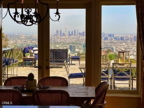 a dining room with furniture and window