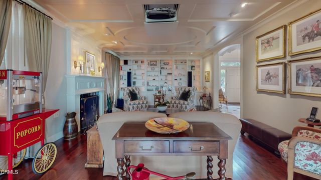 a kitchen with a sink window and cabinets