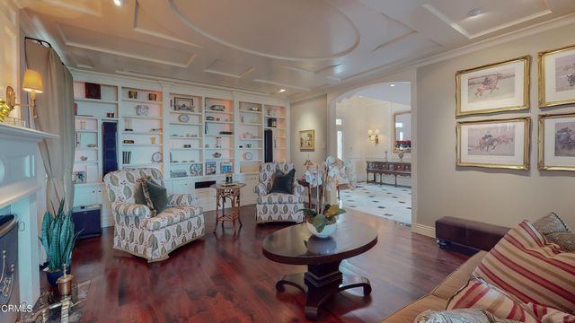 a bathroom with a sink a mirror and a shower