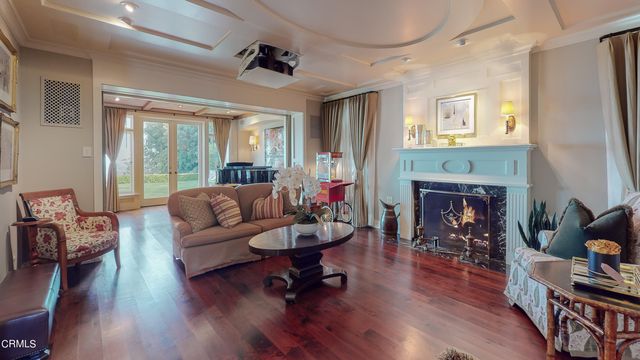 a spacious bathroom with a granite countertop sink and a mirror