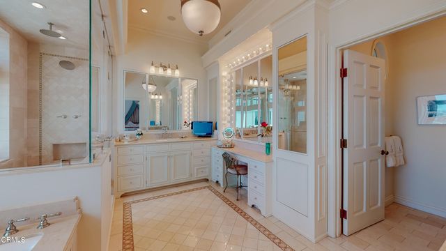 a view of an house with backyard swimming pool and sitting area