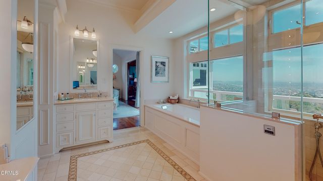 a backyard of a house with yard and outdoor seating