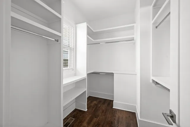 a view of an empty walk in closet