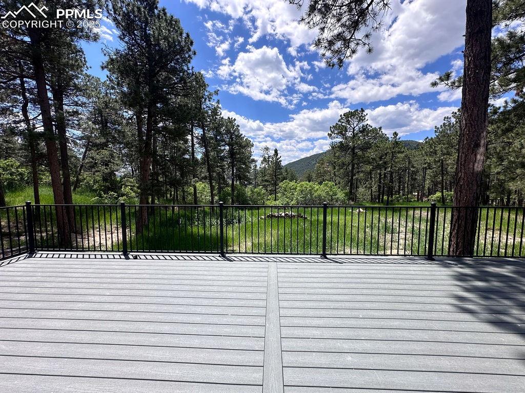 14546 Pine View Road Larkspur, CO 80118 - Photo 36 of 37 View of wooden terrace