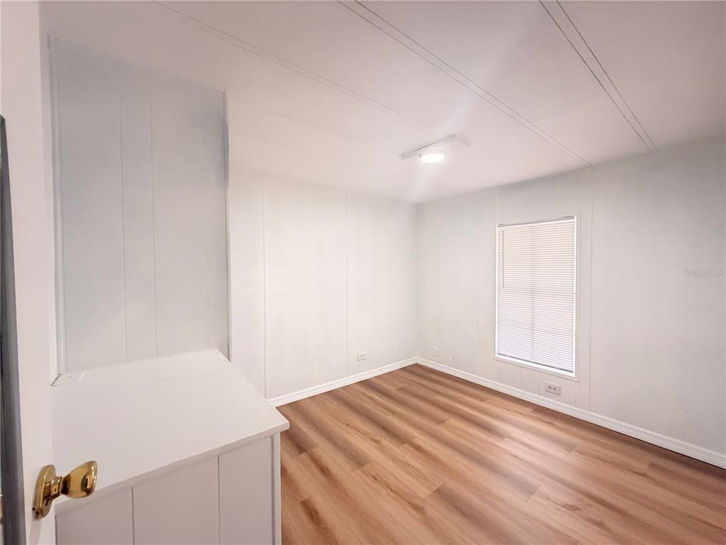 26352 Mc Allister Street Brooksville, FL 34602 - Photo 23 of 26 a view of room and window