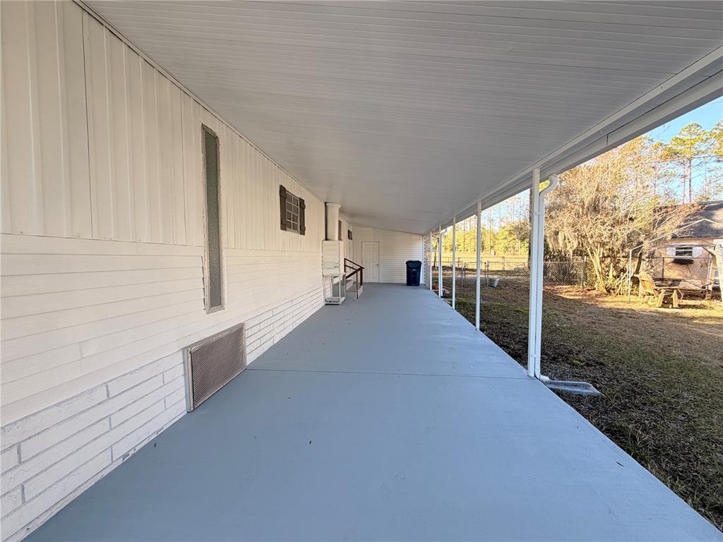 26352 Mc Allister Street Brooksville, FL 34602 - Photo 10 of 26 a view of a balcony with staircase